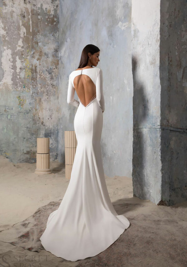 Pre-loved Elary wedding dress with sheer tulle puff sleeves and deep V-neckline