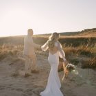 Pre-loved Elary wedding dress with sheer tulle puff sleeves and deep V-neckline