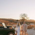 Pre-loved Elary wedding dress with sheer tulle puff sleeves and deep V-neckline