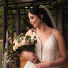 Pre-loved Rochell wedding gown featuring lace detailing and a flowing train