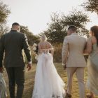 Bride wearing the Hannah romantic tulle A-line wedding dress with floral lace appliqués