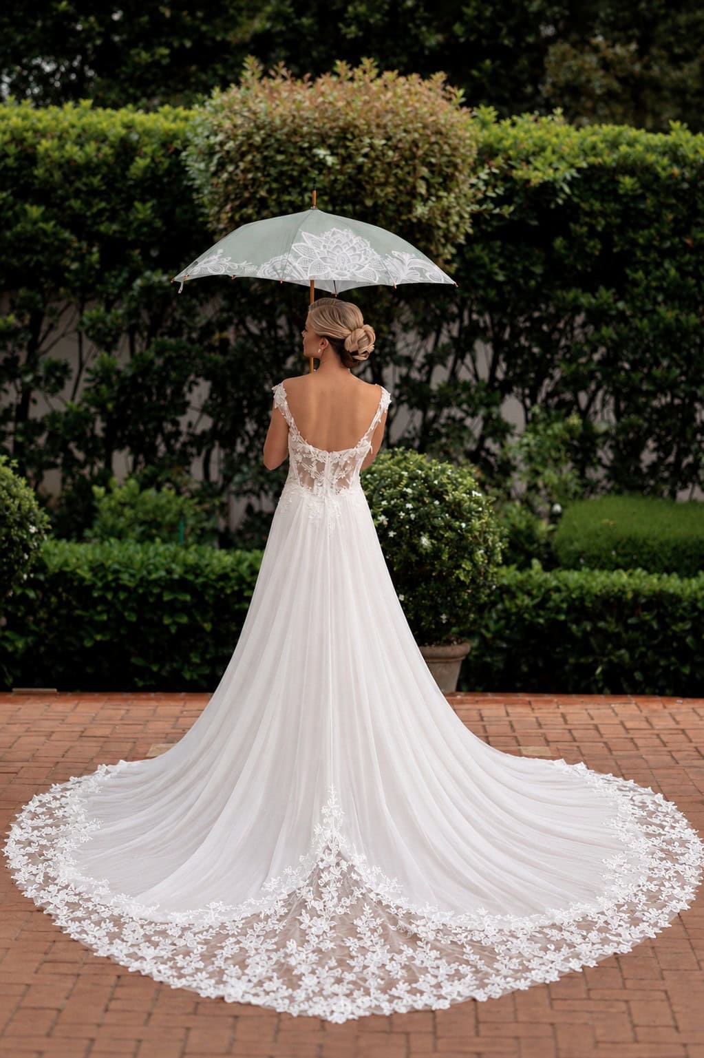 Back of Claire wedding dress with lace-edged chiffon train