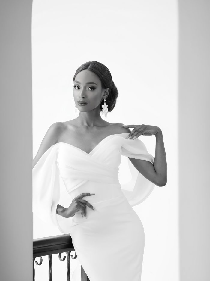 Close-up of Anna wedding dress showcasing the draped sweetheart neckline and soft off-the-shoulder organza sleeves.